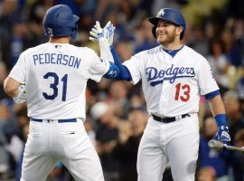 Joc Pederson and Max Muncy (#13) are part of a triple threat from the lefty side of the batter's box. (Image: Gary Vasquez/USA Today Sports)