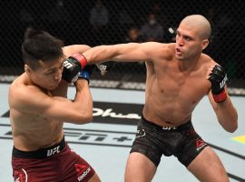 Brian Ortega (right) swept all five rounds to earn a resounding unanimous decision victory over Chan Sung Jung (left) at UFC Fight Night 180. (Image: Josh Hedges/Zuffa/Getty)