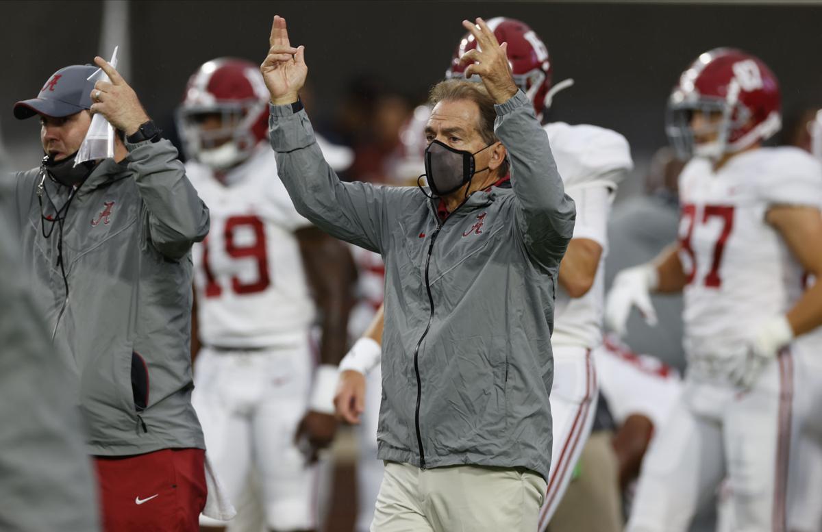 nick saban wearing mask as per college football coronavirus protocols