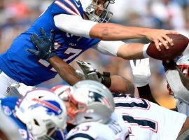 Buffalo Bills QB Josh Allen dives for a touchdown against New England. (Image: Adrian Kraus/AP)