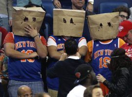 New York Knicks fans at Madison Square Garden embarrassed about their losing ways. (Image: Jonathan Bachman/AP)