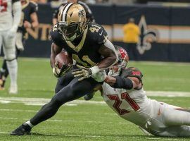 New Orleans Saints RB Alvin Kamara evades tacklers from the Tampa Bay Bucs. (Image: Derick E. Hingle/USA Today Sports)