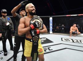 Deiveson Figueiredo (pictured) will defend his flyweight title vs. Alex Perez at UFC 255 on Saturday. (Image: Jeff Bottari/Zuffa/Getty)