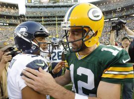 Quarterbacks Russell Wilson and Aaron Rodgers are MVP contenders this season. (Image: Mike Roemer/AP)