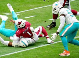 After a strip sack by Miamiâ€™s Emmanuel Ogbah, teammate Shaq Lawson got the NFL Week 9 highlight by scooping up the loose ball and running in for a touchdown. (Image: CBS Sports)