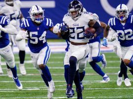 The Indy Colts defense pursues Tennessee Titans star Derrick Henry. (Image: AJ Mast/AP)