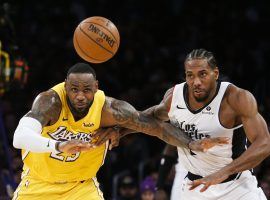 LA Lakers star LeBron James and Kawhi Leonard of the LA Clippers battle once again for a Pacific division title. (Image: Getty)