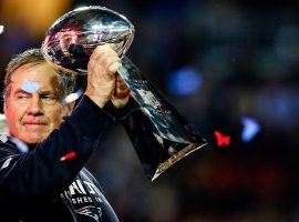 Bill Belichick, seen here hoisting the NFL champion's trophy after the New England Patriots won Super Bowl 49. Belichick leads all coaches with six Super Bowl wins. (Image: Getty)