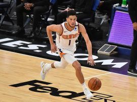 Devin Booker leading the Phoenix Suns in transition. The Suns host the Denver Nuggets with back-to-back games in Phoenix this weekend. (Image: Justin Ford/Getty)