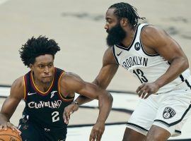 Collin Sexton of the Cleveland Cavs, seen here driving by James Harden of the Brooklyn Nets, scored a career-high 42 points in double overtime. Sexton and the Cavs spoiled the debut of Brooklyn's Big 3. (Image: Bobby Mercurio/Getty)