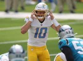 LA Chargers quarterback Justin Herbert, seen here against the Carolina Panthers. Herbert became the sixth QB to win NFL Rookie of the Year since 2010. Â (Image: Sean M. Haffey/Getty)