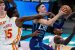 Atlanta Hawks center Clint Capela tries to block Charlotte Hornets guard LaMelo Ball, who would make NBA history as the youngest pro to notch a triple-double. (Image: Suzanne Greenberg)