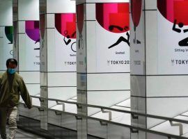 Organizers say that the Tokyo Olympics and Paralympics will go ahead as scheduled, despite reporting that a cancellation is likely. (Image: Eugene Hoshiko/AP)