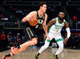 Atlanta Hawks forward Danilo Gallinari, seen here defended by Jaylen Brown from the Boston Celtics, set a career and franchise record with 10 3-point shots. (Image: Suzanne Greenburg/Getty)