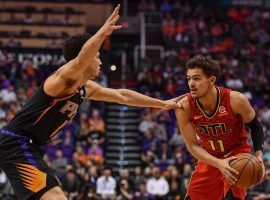 Devin Booker of the Phoenix Suns guards Trae Young from the Atlanta Hawks in a game last season, but both guards were snubs at the 2021 NBA All-Star Game.  (Image: Jen Stewart/USA Today Sports)
