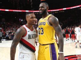 Portland Trail Blazers star Damian Lillard and LeBron James of the Los Angeles Lakers have a showdown in LA on Friday. (Image: Patrick Mahoney/Getty)