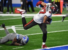 Tampa Bay Bucs tight end Rob Gronkowski, seen here stumbles into the end zone for a touchdown against the Detroit Lions, is a prop bet long shot to score the last touchdown in Super Bowl 55. (Image: Nic Antaya/Getty)
