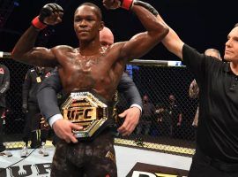 Israel Adesanya (pictured) will try to become the latest two-division champion in the UFC when he takes on light heavyweight champion Jan Blachowicz at UFC 259. (Image: Josh Hedges/Zuffa)