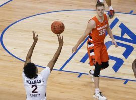 Virginia freshman Reece Beekman shoots a game-winning 3-pointer to defeat Syracuse in the ACC conference tournament in Greensboro, North Carolina. (Image: AP)