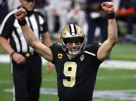 Future Hall of Fame quarterback Drew Brees celebrates throwing a touchdown for the New Orleans Saints in the Superdome. (Image: Chris Graythen/Getty)