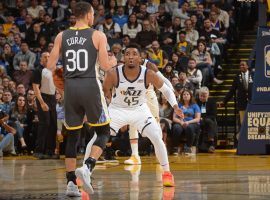 Donovan Mitchell of the Utah Jazz defends Steph Curry from the Golden State Warriors, and the two meet in one of the biggest games this weekend. (Image: Noah Graham/Getty)