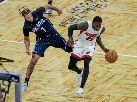 Rookie point guard Cole Anthony of the Orlando Magic gets sideswiped by Miami Heatâ€™s Kendrick Nunn at Amway Center in Orlando. (Image: Alex Mendez/Getty)