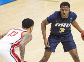 Oral Roberts sophomore Max Abmas, seen here against Ohio State in the first round of March Madness, leads the nation in scoring. Â (Image: Robert Franklin/AP)