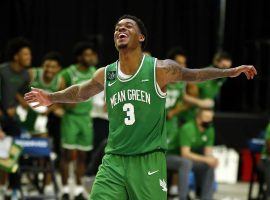 North Texas star Javion Hamlet celebrates an overtime victory over Western Kentucky in the Conference USA championship game. (Image: Tim Heitman/USA Today Sports)