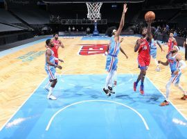 Shake Milton (18) of the Philadelphia 76ers drives the lane against Jarrett Allen of the Brooklyn Nets in an Atlantic Division match up at Barclay's Arena in Brooklyn. (Image: Nathaniel S. Butler/Getty)