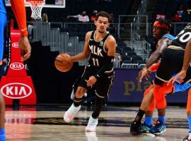 Trae Young of the Atlanta Hawks evades defenders in transition against the Oklahoma City Thunder. (Image: Scott Cunningham)