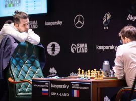 Ian Nepomniachtchi (left) secured a draw against Maxime Vachier-Lagrave (right) on Monday, which was enough to clinch victory in the Candidates Tournament. (Image: Lennart Ootes/FIDE)