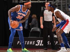 Julius Randle of the New York Knicks, seen here defended by Jerami Grant of the Detroit Pistons, currently is the consensus favorite to win the 2021 NBA MIP. (Image: Chris Schwegle/Getty)