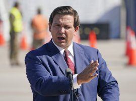 Florida Gov. Ron DeSantis and the Seminole Tribe of Florida recently agreed to a new gaming compact, paving the way for expanded gambling in the state.. (AP Photo/Wilfredo Lee)