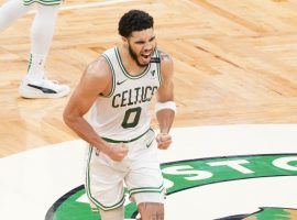 Jayson Tatum from the Boston Celtics celebrates a ridiculous comeback victory against the San Antonio Spurs on the same night he set a personal milestone with 60 points.Â (Image: Ryan Mansfield/Getty)