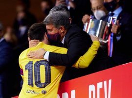 Lionel Messi is congratulated by Barcelona president Joan Laporta after winning the Spanish Cup. (Image: Twitter / @JoanLaportaFCB )