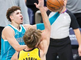 Charlotte Hornets rookie point guard LaMelo Ball drives to the basket against Domantas Sabonis from the Indiana Pacers. The Pacers and Hornets square off in the NBA Play-in Tournament in the Nine-Ten Game. (Image: Jared C. Tilton/Getty)