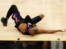 Chris Paul of the Phoenix Suns fell to the floor with a shoulder injury during the second quarter of Game 1 against the LA Lakers. (Image: Getty)