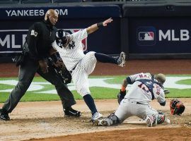 NY Yankees second baseman moments after his knee collided with the head of Houston Astros' catcher Martin Maldonado. (Image: AP)