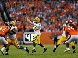 Green Bay Packers quarterback Aaron Rodgers, seen here during a 2019 game against the Denver Broncos, is rumored to head to the Broncos in a trade. The Broncos saw their Super Bowl 56 odds explode over the weekend based on the Rodgers rumor. (Image: Justin Edmonds/Getty)