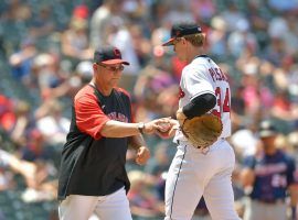 Zach Plesac (right) injured his thumb while tearing off his shirt after his start on Sunday. (Image: Jason Miller/Getty)