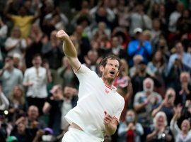 Andy Murray won his first-round match on Monday, marking his first win at Wimbledon in four years. (Image: Kristy Wigglesworth/AP)