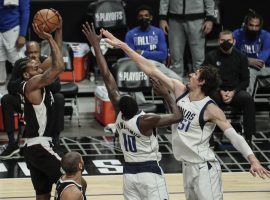 Kawhi Leonard of the Los Angeles Clippers shoots over Dorian Finney-Smith (10) and Boban Marjanovic (51) during Game 5 at the Staples Center in LA. (Image: LA Times)