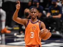 Chris Paul calls out a play for the Phoenix Suns during the Western Conference playoffs, but heâ€™s currently on ice while recovering from COVID-19. (Image: Getty)