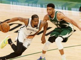 Kevin Durant of the Brooklyn Nets drives by Giannis 'Greek Freak' Antetokounmpo from the Milwaukee Bucks when the two teams met in May at Fiserv Forum in Milwaukee. (Image: Getty)