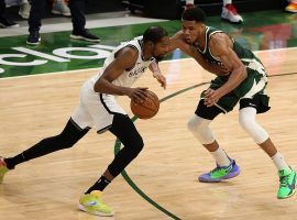 Kevin Durant of the Brooklyn Nets drives to the hole against Giannis 'Greek Freak' Antetokounmpo of the Milwaukee Bucks. (Image: Getty)