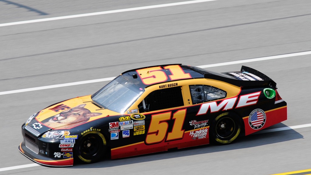 Kurt Busch pokes fun at NASCAR's sponsorship model with Talladega Nights knockoff paint scheme.