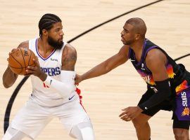 PG-13 vs. CP3 with Paul George of the LA Clippers defended by Chris Paul from the Phoenix Suns during the regular season. (Image: Christian Peterson/Getty)
