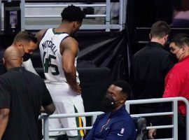 Donovan Mitchell from the Utah Jazz limps off to the locker room after an ankle injury in the fourth quarter of Game 3 against the LA Clippers at the Staples Center in LA. (Image: Peter Carini/Getty)