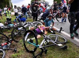 It was impossible for the peloton to avoid the carnage after the first crash in Stage 1 of the 2021 Tour de France, which began in Brest and finished in Landerneau. (Image: EPA)