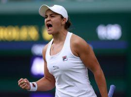 Ashleigh Barty (pictured) will take on former champion Angelique Kerber in on of the womenâ€™s semifinal matches at Wimbledon on Thursday. (Image: PA Wire)